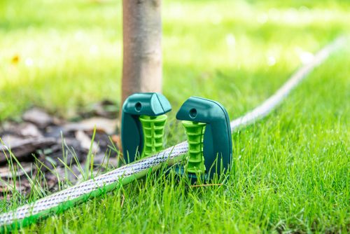 Verto görgős tömlővezető, nyitott, földbeszúrható