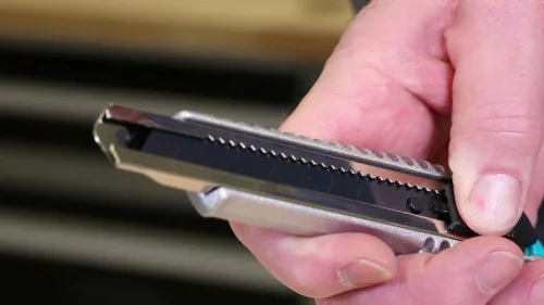 Wolfcraft letörhető pengés kés, 18 mm, fekete pengés, fémházas